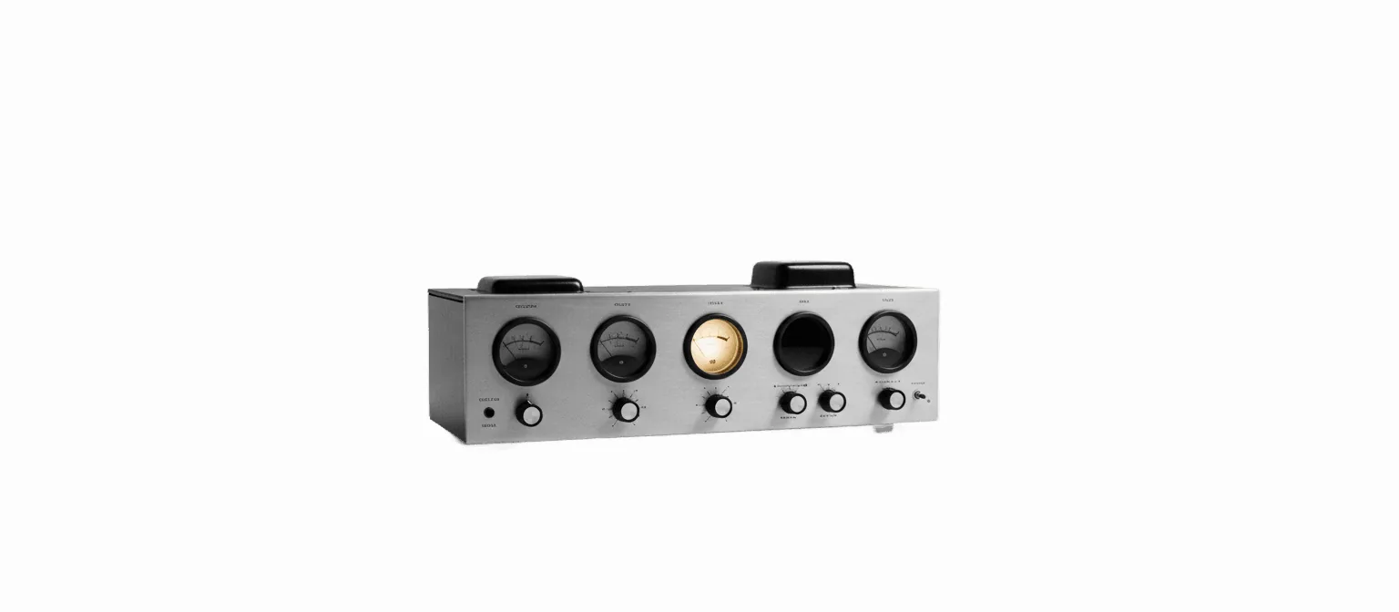The control panel of a vintage tube amplifier with a row of round dials, the center dial glowing warm yellow, black and white.